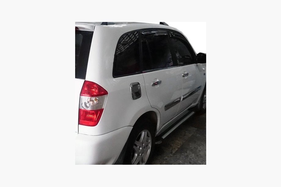 Chery Tiggo 1 2005–2016 Tankklep cover (Omsa, RVS) Foto 1
