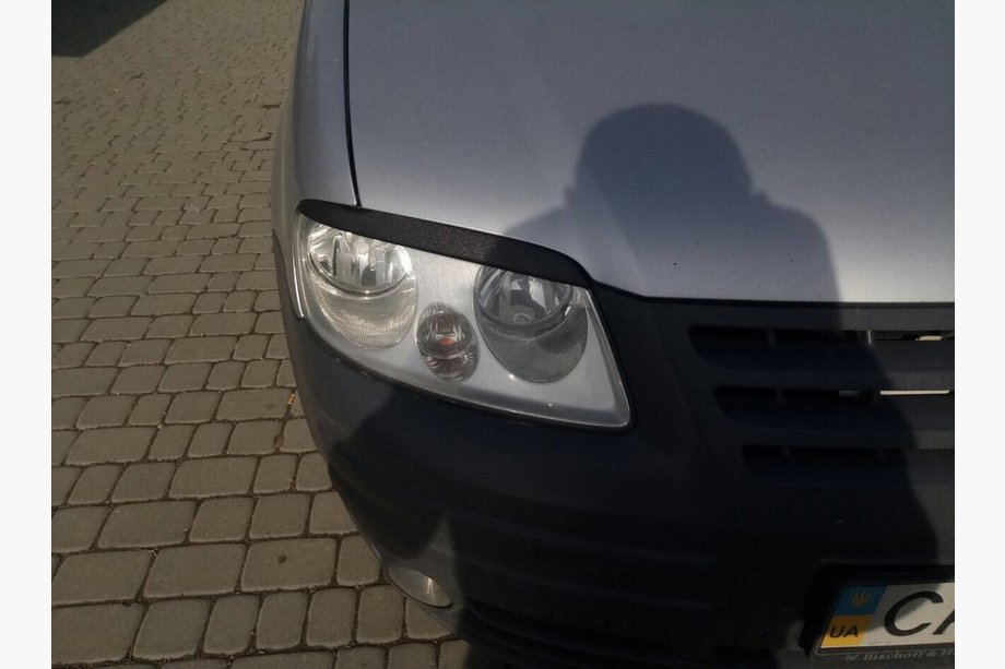 Volkswagen Caddy 2004–2010 Koplampwimpers (zwart) Foto 8