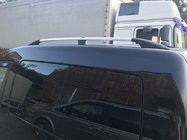 Volkswagen Caddy 2004–2010 Chromen dakrails Standaard, metalen voetjes foto 1