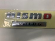 Nissan Patrol Y62 2010–2024 Nismo-embleem foto 1