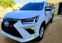 Toyota Hilux 2015– Voorbumper Lexus-design V2 (voor 2015-2020) foto 1