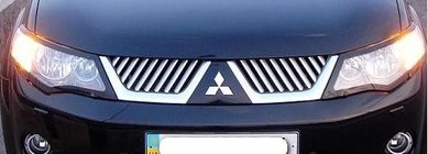 Mitsubishi Outlander 2006–2012 Grille sierlijsten (2006-2010, RVS) foto 1