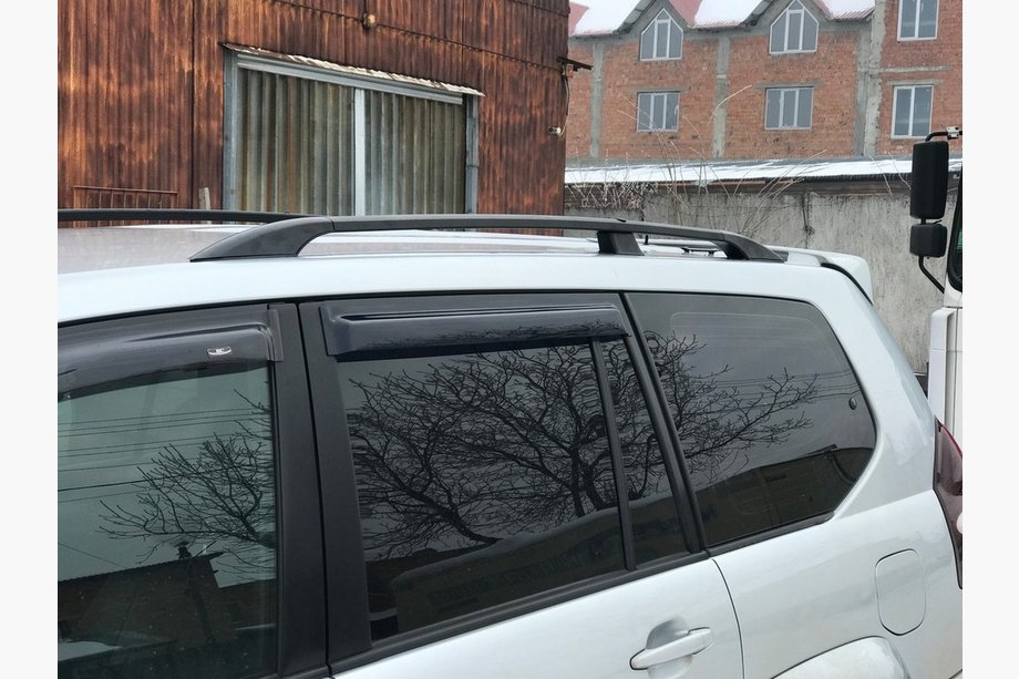 Toyota Land Cruiser Prado 120 2002–2009 Zwarte Turkse dakrails Metalen montagevoeten Foto 5