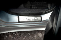 Mitsubishi Lancer X 2008– Instaplijsten (OMSA, 4 stuks, RVS) foto 3