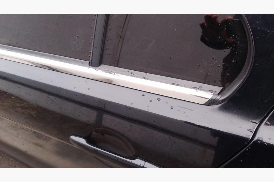 Mitsubishi Lancer X 2008– Buitenste raamlijstomlijsting RVS (set 4 stuks) Foto 2