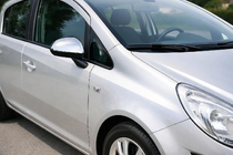 Opel Corsa D 2007–2014 RVS spiegelkappen (set van 2) foto 1