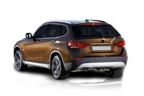 BMW X1 E84 2009–2015 RVS sierstrip boven kentekenplaat foto 1