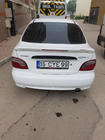 Hyundai Accent 1994–1999 Meliset spoiler (spuitklaar) foto 2