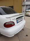 Hyundai Accent 1994–1999 Meliset spoiler (spuitklaar) foto 1