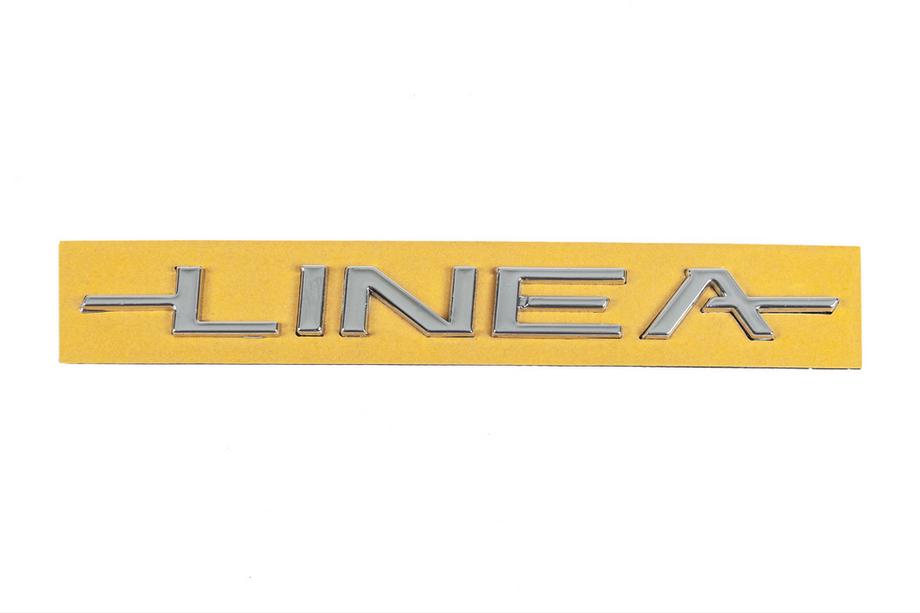 Fiat Linea 2006–2018 Opschrift Linea embleem 51767266 (180 mm x 16 mm) Image