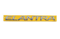 Hyundai Elantra (MD/UD) 2011–2015 Elantra embleem 863153X100 (250 mm x 22 mm) foto 1