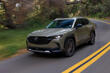 Review van de vierwielaangedreven crossover Mazda СХ-50 foto 2