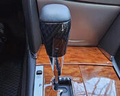 Toyota Land Cruiser 200 2007–2021 Pookknop (zwart leer + carbon) foto 2