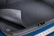 Welke kofferbakmat is beter: rubber of textiel? foto 1