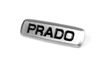 Toyota Prado aluminium embleem voor matten (1 st.) foto 2