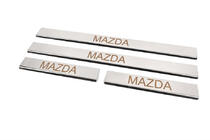 Mazda 3 2003–2009 Instaplijsten Carmos (set van 4, RVS) V-3 foto 2