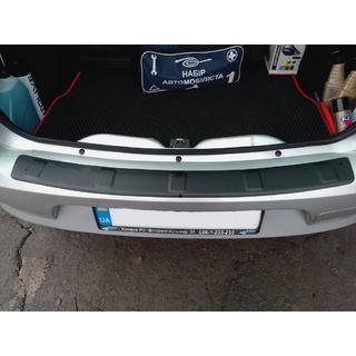 Achterbumper diffuser (SD, ABS, Esa) foto 1