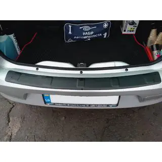 Achterbumper diffuser (SD, ABS, Esa) foto 1