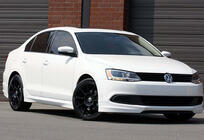 Volkswagen Jetta 2011–2018 DPT sideskirts (voor lakken) foto 1