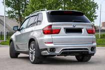 BMW X5 E70 2007–2013 Achterbumper diffuser inzetstuk (2010-2013, spuitklaar) foto 1