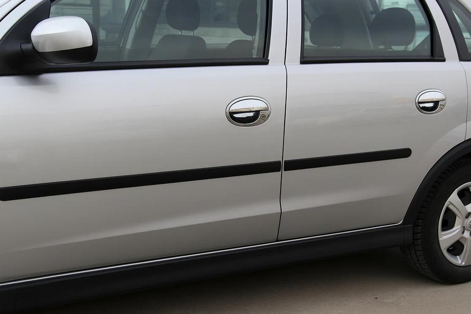 Opel Corsa C 2000–2006 Deurgreepkappen met omlijsting (8-delig, RVS) Image