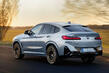 Review van de coupé-SUV BMW X4: faceliftversie foto 4