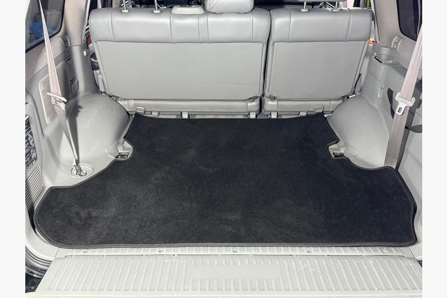 Toyota Land Cruiser 100 1998–2007 Textiele kofferbakmat Classic, 2 stuks, zwart (7 zitplaatsen) Foto 2