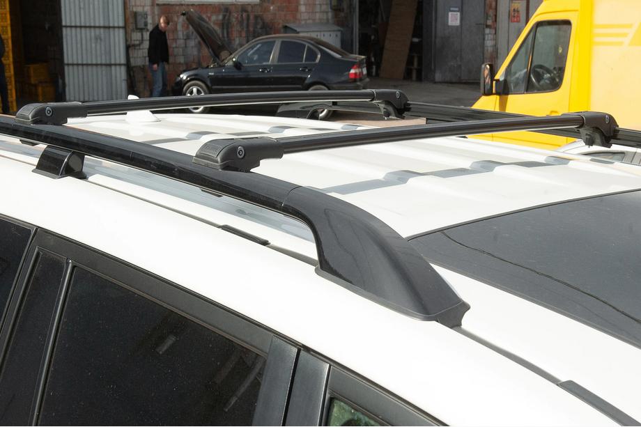 Kia Carnival 2021– Dakdragers (dwarsdragers) voor standaard dakrails, afsluitbaar met sleutel, WingBar V1 (2 stuks) Tot 140 cm, grijs Foto 5