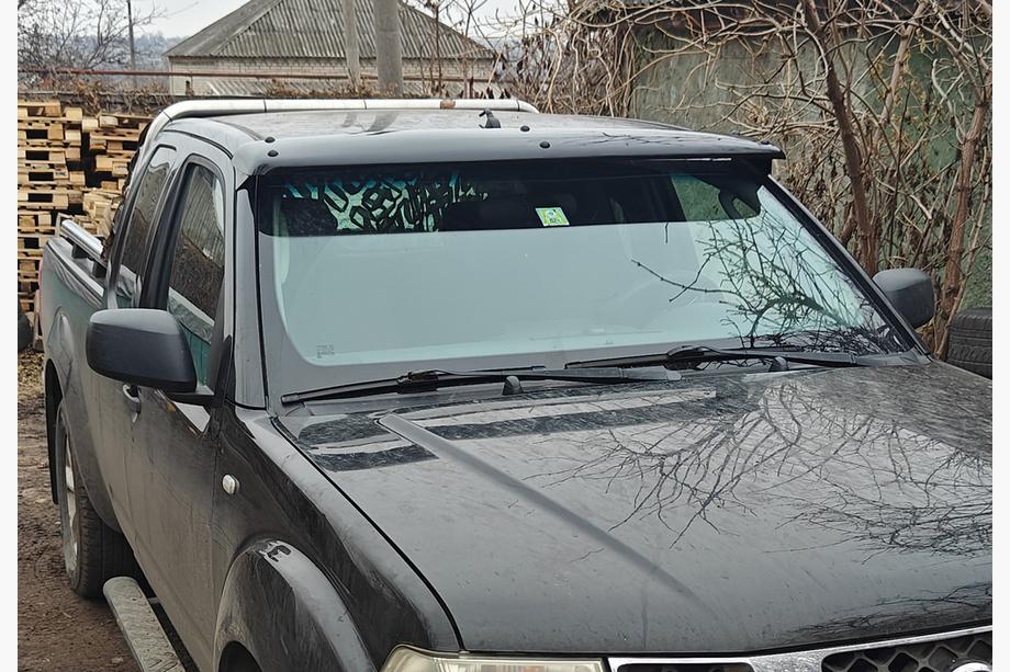 Nissan Navara 2006–2015 Voorruitvizier (op frame) Image