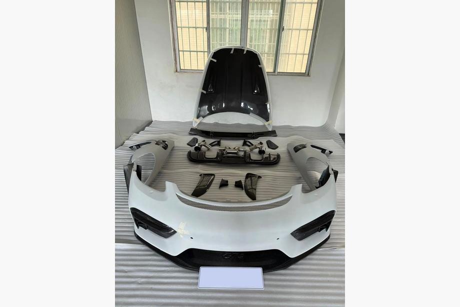 Porsche Boxster/Cayman 982 (718) 2016– GT4 bodykit (ABS + carbon) Image