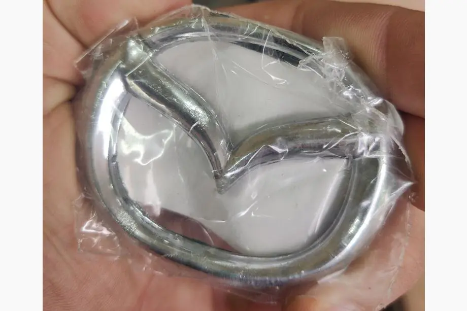 Mazda Afgeprijsd Mazda-embleem (65 x 50 mm) Foto 5