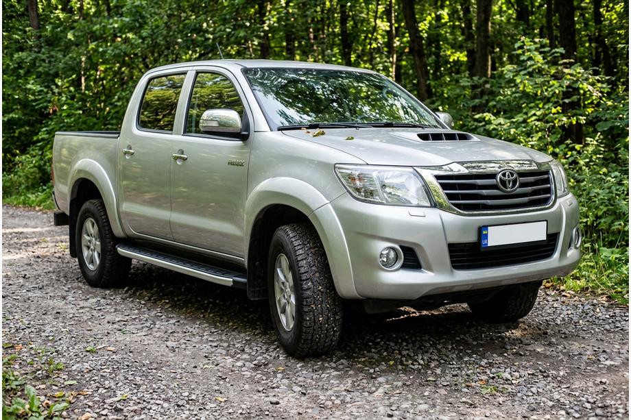 Toyota Hilux 2006–2015 Fullmond side steps (2 stuks, aluminium) Image