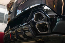 BMW XM G09 2022– Achterbumper diffuser AE (carbon) foto 6