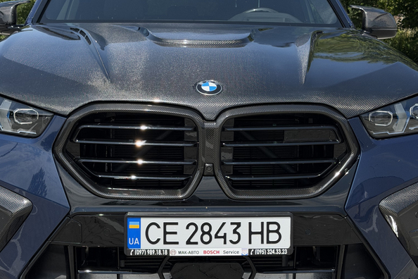 BMW X5 G05 2018 → X5M 2025: complete upgrade met carbon bodykit en M-stuur Foto 15