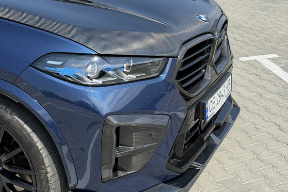 BMW X5 G05 2018 → X5M 2025: complete upgrade met carbon bodykit en M-stuur Foto 12