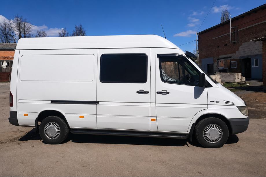 Volkswagen LT 1995–2006 Premium Black side steps (set 2 stuks, RVS) Image