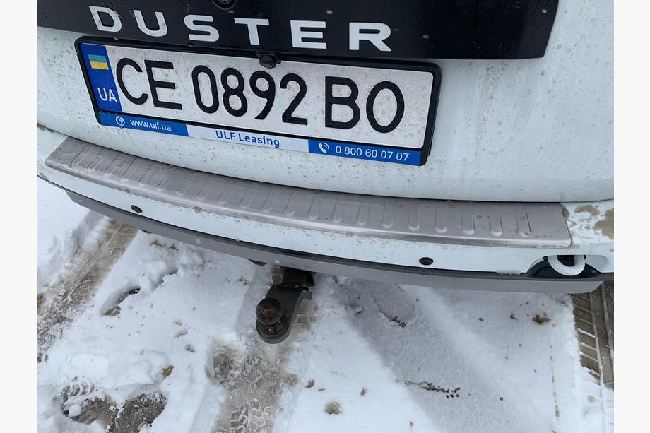 Dacia Duster 2008–2018 Achterbumper beschermplaat Carmos V1 met omgezette rand (RVS) Foto 2