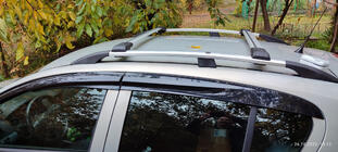 Opel Astra H 2004–2013 Dwarsdragers voor standaard dakrails, afsluitbaar met sleutel (2 stuks) foto 1