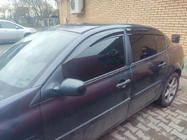 Renault Megane II 2004–2009 Raamwinddeflectoren SD (4 stuks, Perflex Sport) foto 1