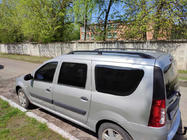 Dacia Logan MCV 2004–2014 Zwarte dakrails Metalen montagevoeten foto 1