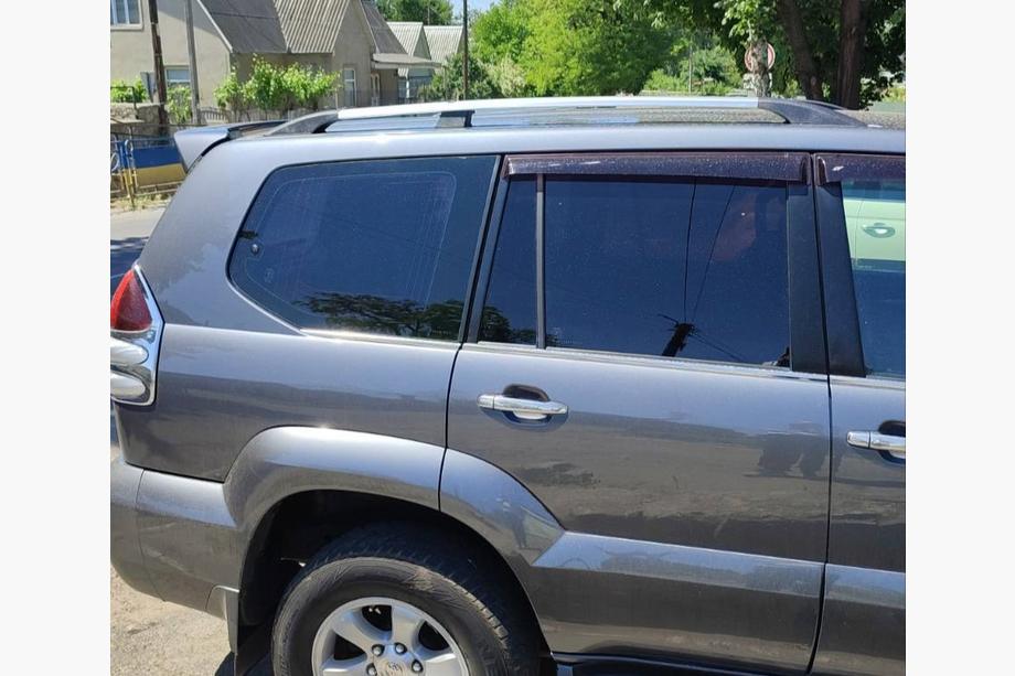 Toyota Land Cruiser Prado 120 2002–2009 Turkse chromen dakrails Kunststof voetjes Image