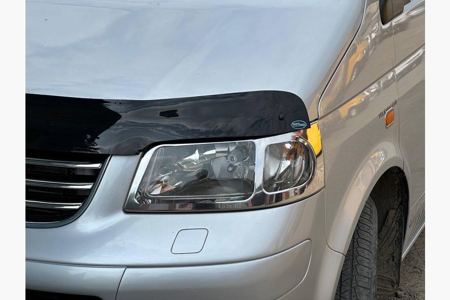 Volkswagen T5 Caravelle 2004–2010 Koplampranden (2 stuks, RVS) Foto 3