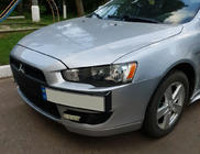 Mitsubishi Lancer X 2008– Kentekenplaathouder (kunststof) foto 1