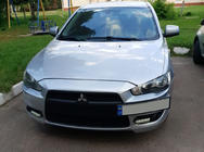 Mitsubishi Lancer X 2008– Kentekenplaathouder (kunststof) foto 3