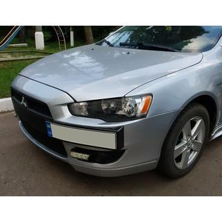Kentekenplaathouder (kunststof) Mitsubishi Lancer X 2008– foto 1