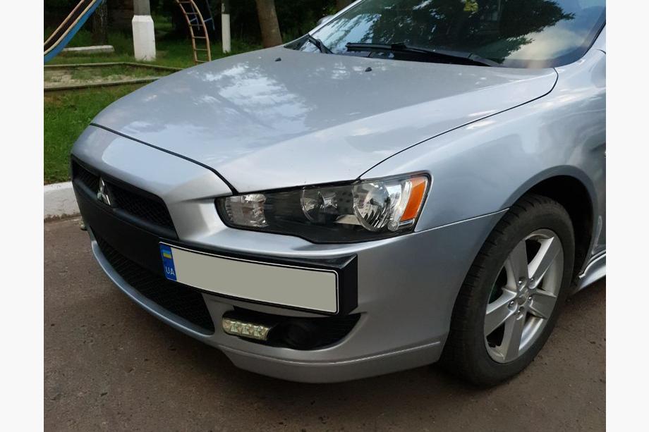 Mitsubishi Lancer X 2008– Kentekenplaathouder (kunststof) Image
