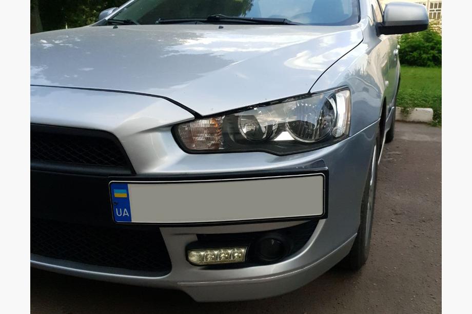 Mitsubishi Lancer X 2008– Kentekenplaathouder (kunststof) Mat zwart Foto 2