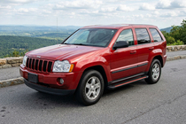 Jeep Grand Cherokee WK 2004–2010 Side steps Maya Red (2 stuks, aluminium) foto 1