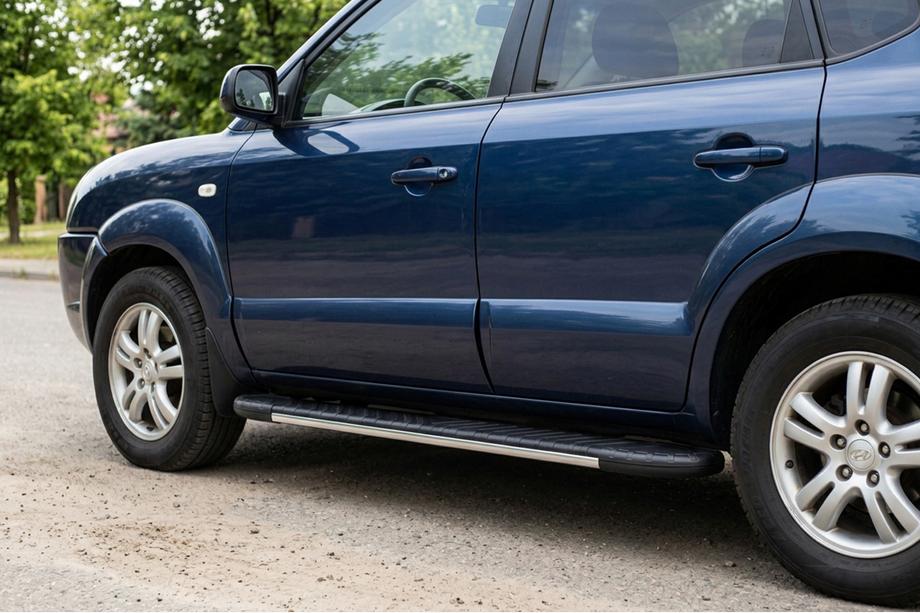 Hyundai Tucson JM 2004– Bosphorus Grey zijsteps (set van 2, aluminium) Image