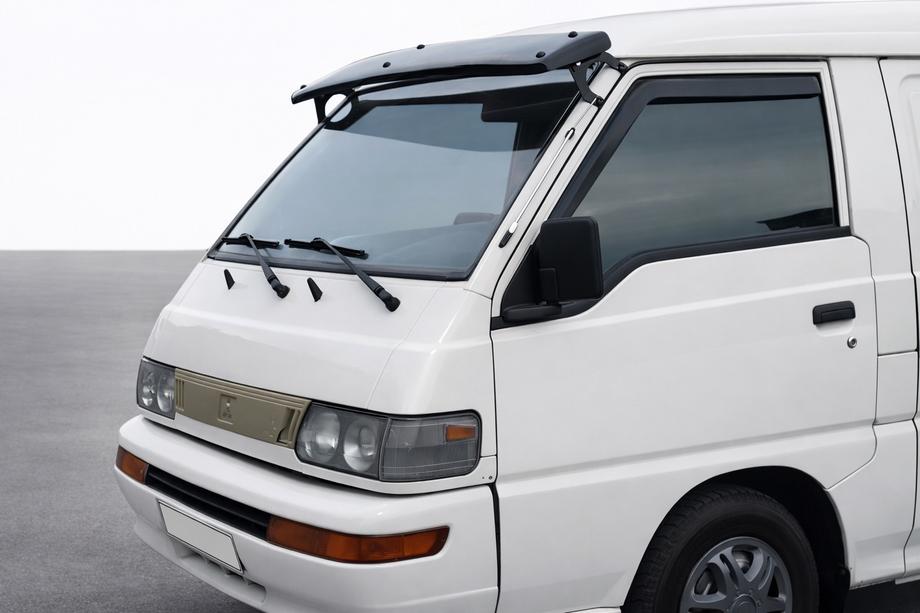 Mitsubishi L300 1986–2013 Zonneklep voor de voorruit Foto 1